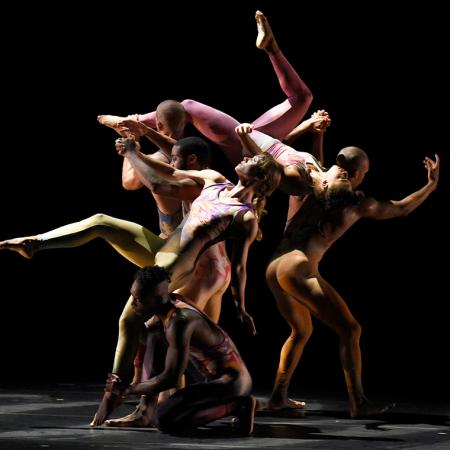 Member of Pilobolus on stage